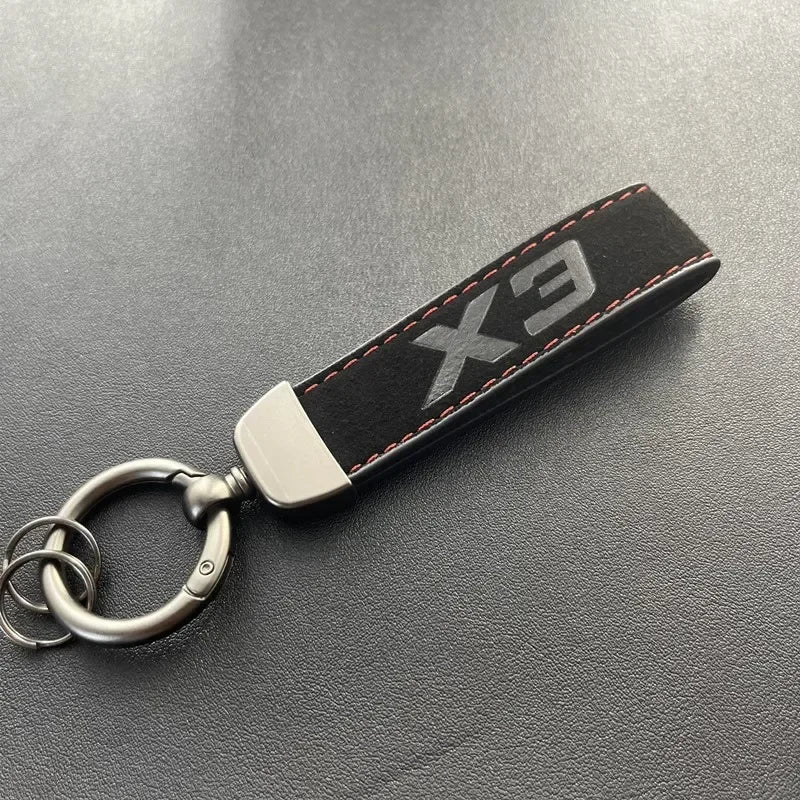 Porte-clés série X en cuir suédé