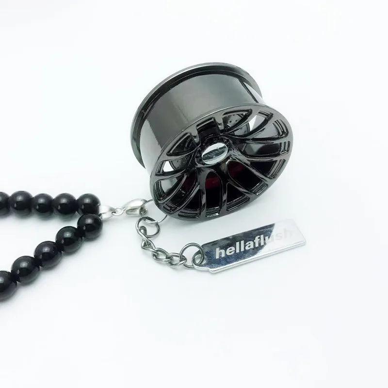 Ciondolo per mozzo ruota auto