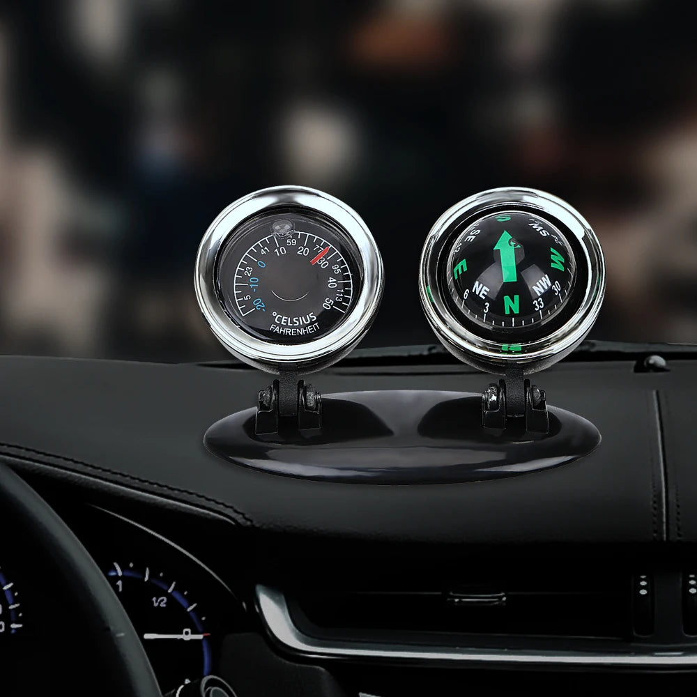 Classic dashboard compass and thermometer dual-dial set mounted on a car dashboard