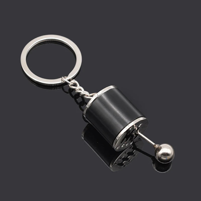 Chaveiro de peças de carros