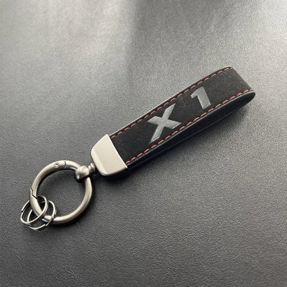 Porte-clés série X en cuir suédé 