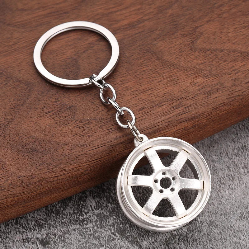 Chaveiro de peças de carros