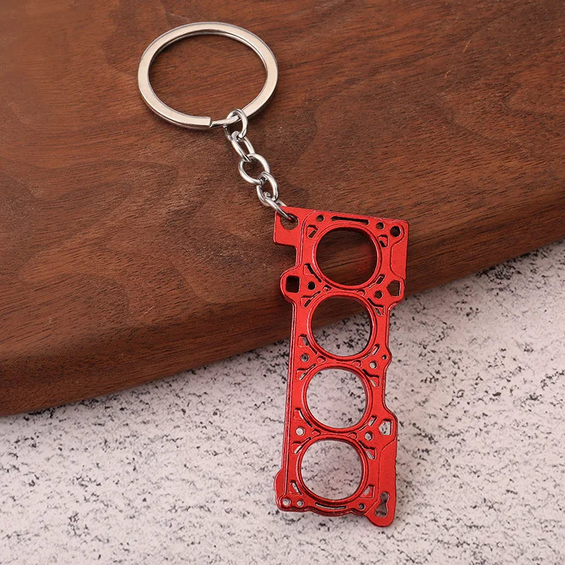 Chaveiro de peças de carros