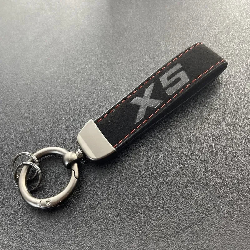 Porte-clés série X en cuir suédé 