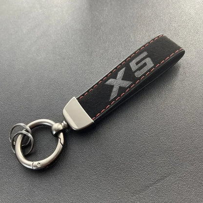 Porte-clés série X en cuir suédé 