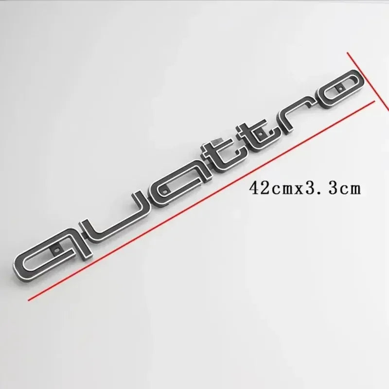 Quattro-Frontgrill-Emblem