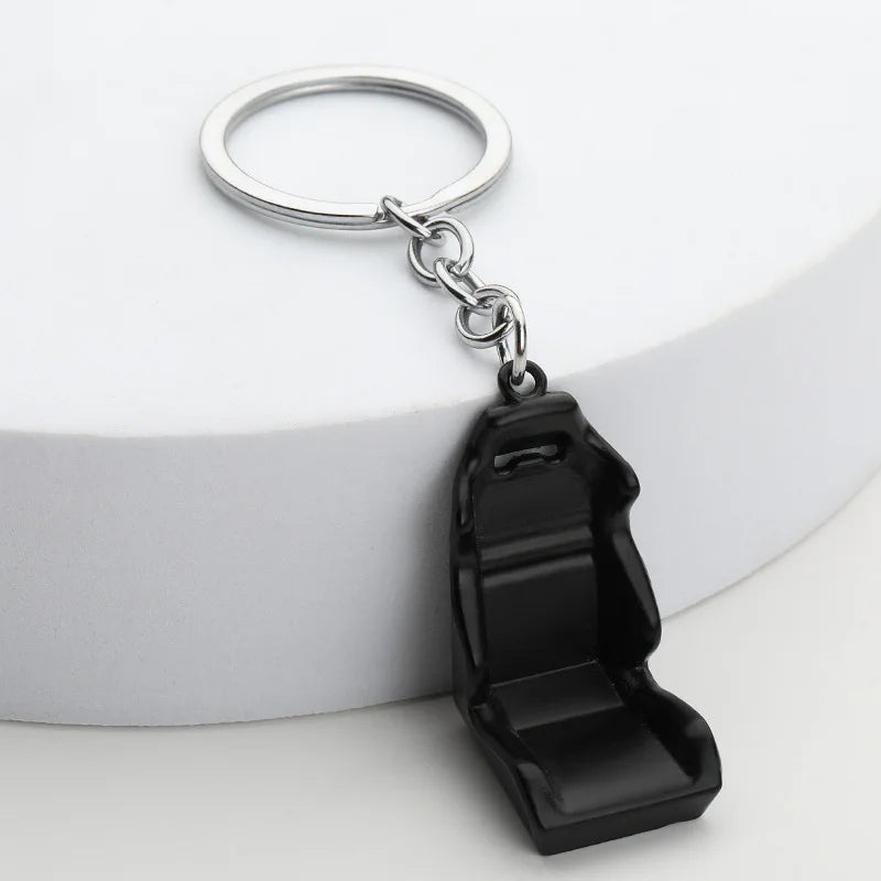 Chaveiro de peças de carros