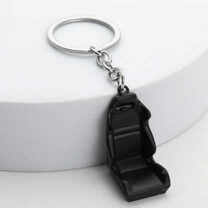 Chaveiro de peças de carros