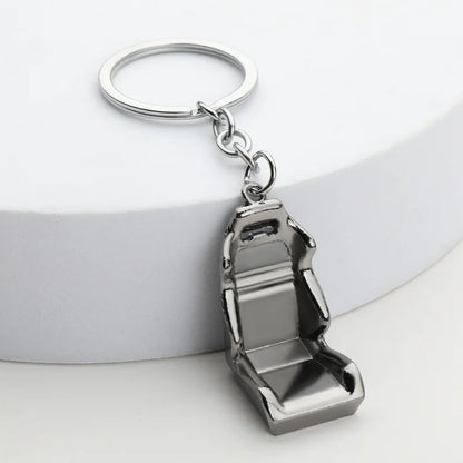 Chaveiro de peças de carros