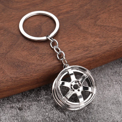 Chaveiro de peças de carros