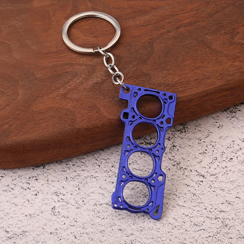 Chaveiro de peças de carros