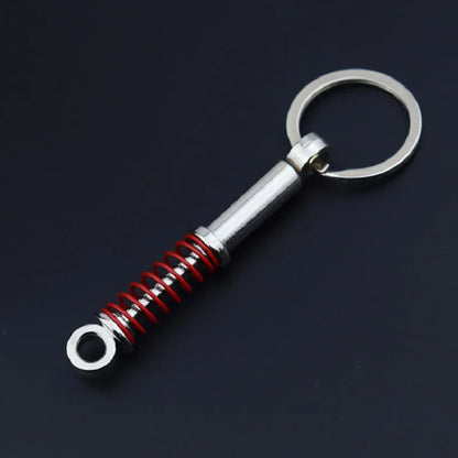 Chaveiro de peças de carros