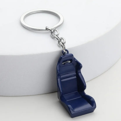 Chaveiro de peças de carros