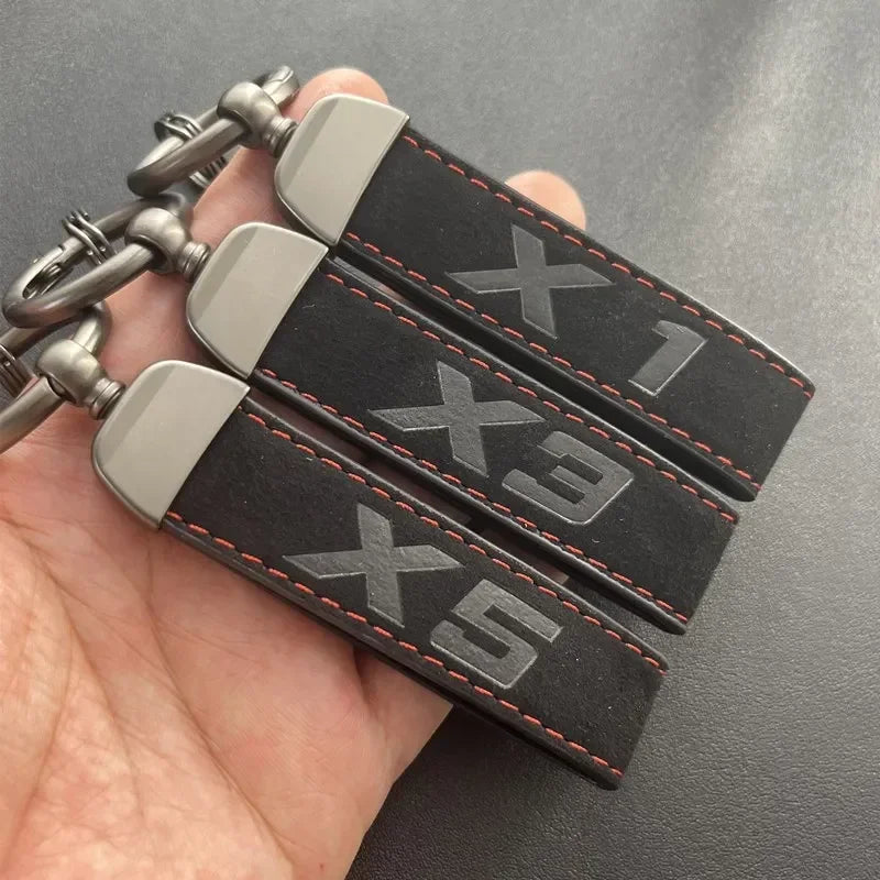 Porte-clés série X en cuir suédé 