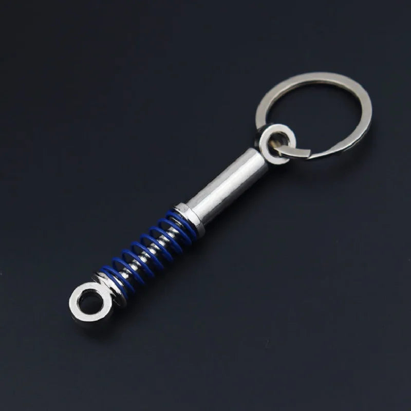 Chaveiro de peças de carros