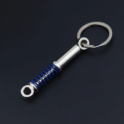 Chaveiro de peças de carros