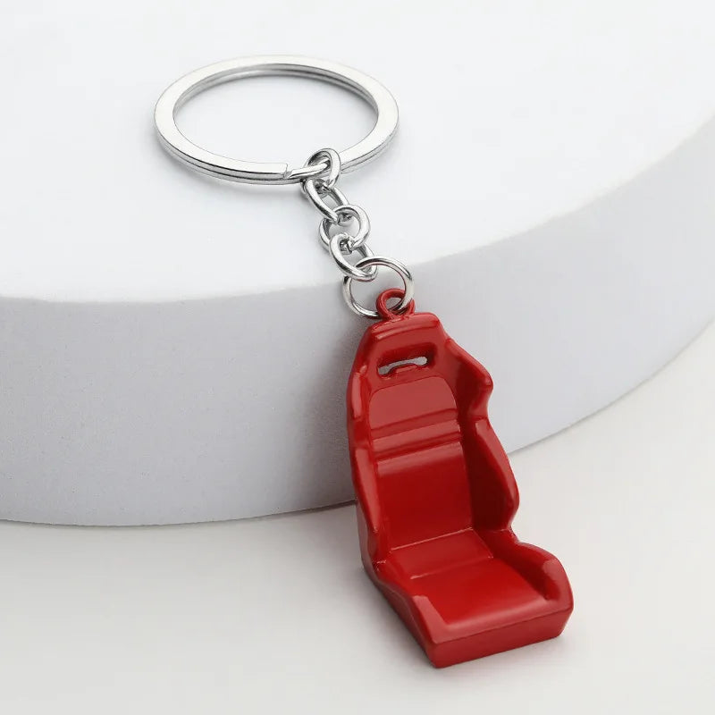 Chaveiro de peças de carros