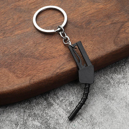 Chaveiro de peças de carros