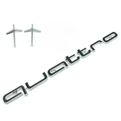 Quattro-Frontgrill-Emblem